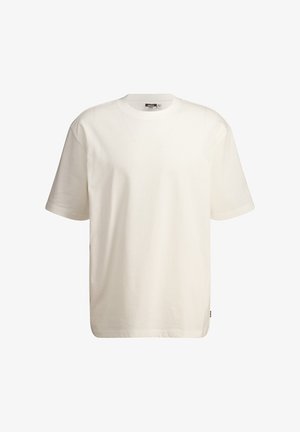 T-shirt en coton blanc à manches courtes, col rond et coupe décontractée. Il présente un ourlet droit et un minimum de marquage sur le côté.
