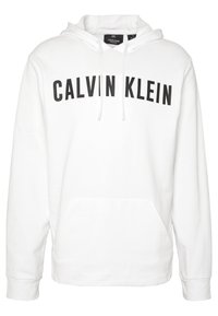 Sweat à capuche blanc avec un grand logo noir "CALVIN KLEIN" sur la poitrine. Confectionné en tissu doux avec une poche avant et des cordons de serrage.