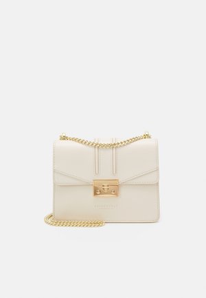 Cream leather crossbody bag with a gold chain strap, rectangular shape, front flap, and gold hardware closure featuring a logo.