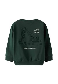 Sweatshirt vert foncé avec col rond. Présente un graphisme texturé d'un excavateur et le texte "BONNES JOURS EN VUE" et "SOYEZ TOUJOURS POSITIF."