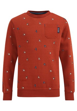 Langärmliges Sweatshirt in Rostfarbe mit kleinen blauen und weißen Vogelmotiven und einer Brusttasche mit einem schwarzen Etikett mit weißem Text.
