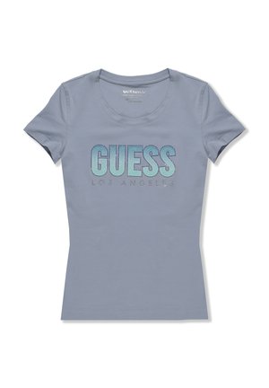 T-shirt a maniche corte di colore azzurro chiaro in cotone con collo rotondo; presenta il logo "GUESS LOS ANGELES" in colori degradè e dettagli lucidi.