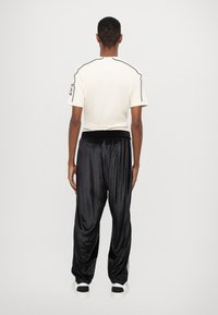 EA7 Emporio Armani TUTA SPORTIVA - Tuta - black