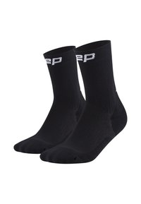 Ein Paar schwarze Crew-Socken mit weißer Beschriftung am Bund, gerippter Textur und verstärkten Fersen- und Zehenbereichen.