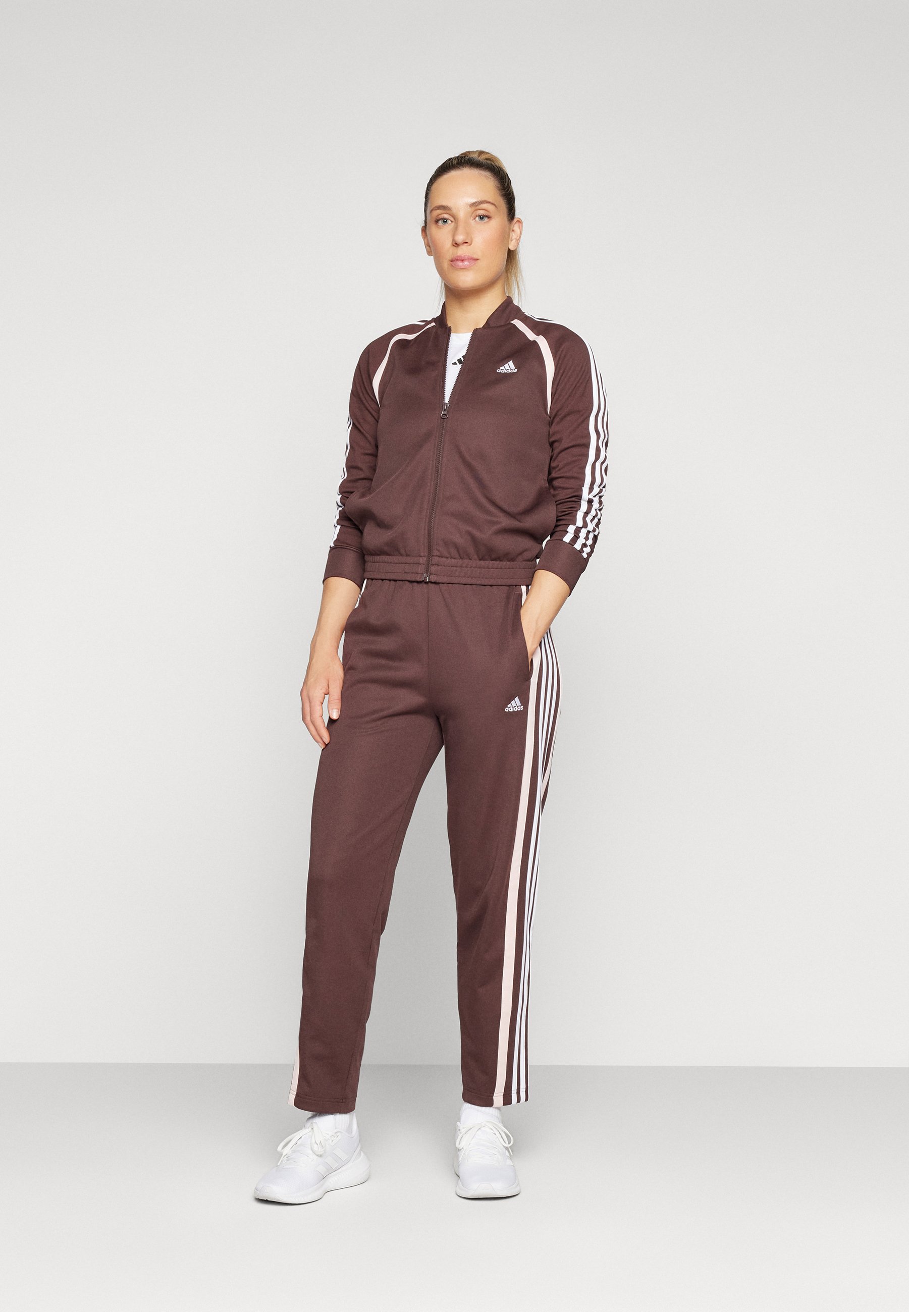 brown adidas track suit