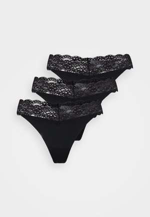Černé krajkové tangá kalhotky s vlnkovaným krajkovým pasem. Měkký materiál s hladkým povrchem, obsahuje tři podobné páry.