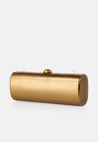 Gold metallic clutch with a textured snake-skin pattern, cylindrical shape, rounded closure, and two small hardware loops on the sides.