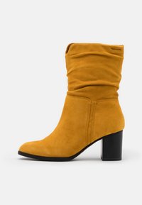 Tamaris Stiefel - saffron