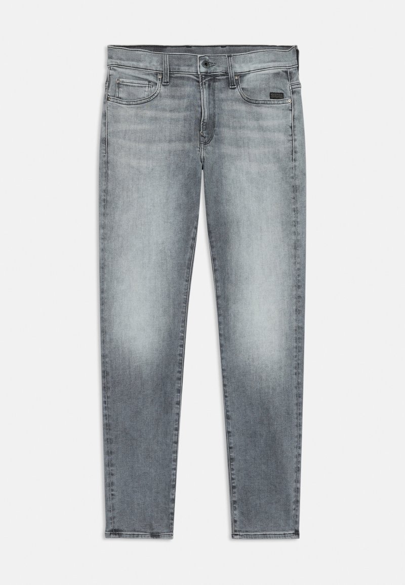 Jean en denim gris clair avec une finition délavée, cinq poches et une taille standard. Présente des coutures subtiles et une coupe droite.