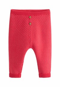 Rote Strickhosen mit kleinen weißen Herzmustern, geripptem Bund und Bündchen, mit zwei Holzknöpfen auf der Rückseite.