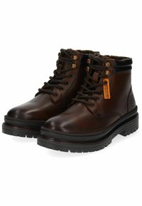 Bruine leren enkellaarsjes met zwarte accenten, ronde neus, gevoerde kraag, metalen oogjes en een gestructureerde rubberen zool. Voorzien van een merketiket.
