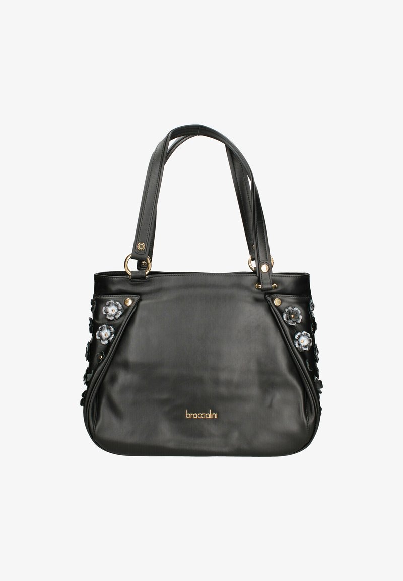 Sac à main en cuir noir avec des appliqués floraux sur les côtés, deux poignées pour l'épaule et des accents en métal doré. Nom de la marque affiché en bas.