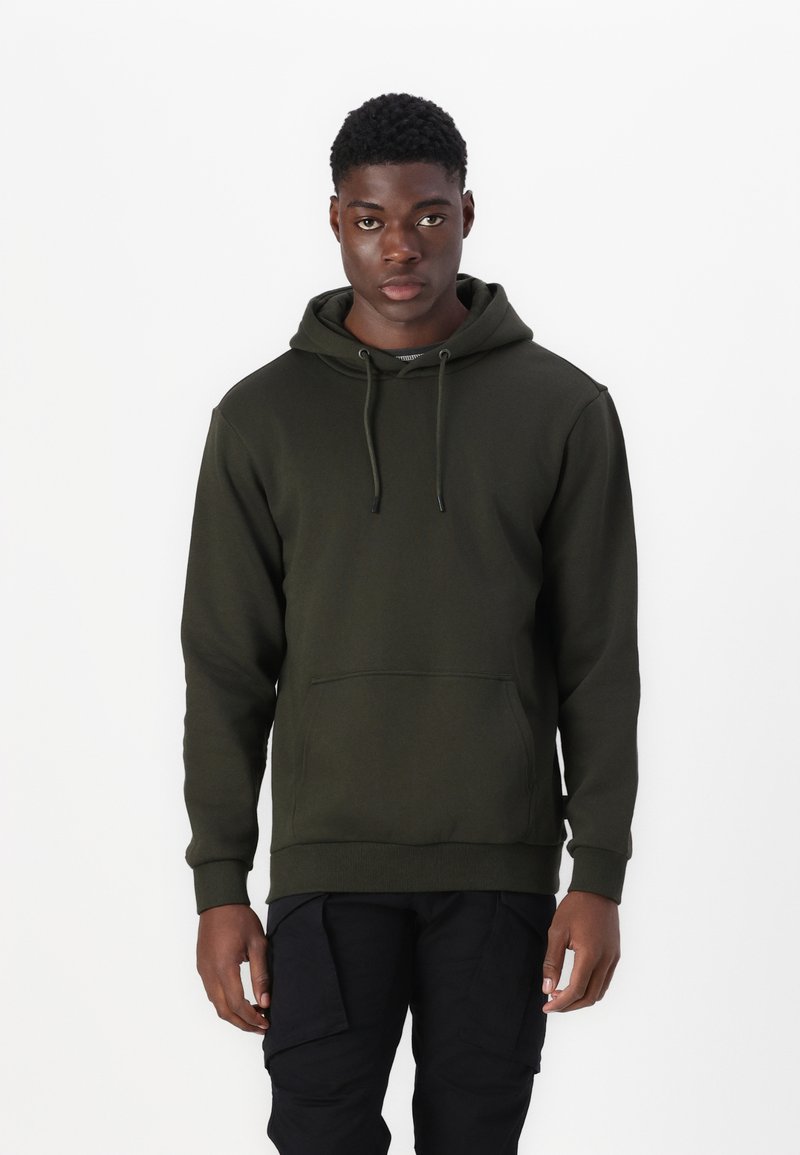 Dark green hoodie with a drawstring hood, ribbed cuffs, and a front pocket. Accessory details include flat laces and a smooth texture.