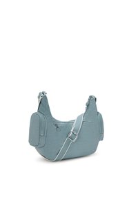 Small slate blue crossbody bag with adjustable strap, front and side zip pockets, made from crinkled fabric.