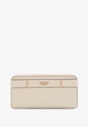 Portafoglio in pelle beige con dettagli in metallo dorato, logo centrato sulla parte anteriore, forma rettangolare slim e chiusura con zip lungo il bordo superiore.