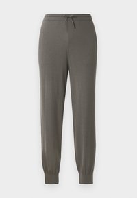 Grå joggebukser med snøring i livet, avsmalnende sømmer, myk tekstur og et glatt, minimalistisk design.