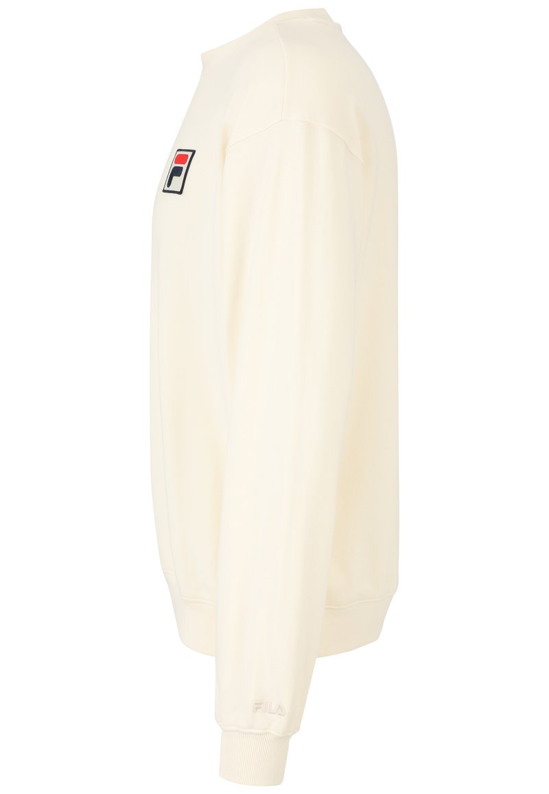 Felpa color crema, in materiale misto cotone, collo a giro, maniche lunghe, presenta un piccolo logo ricamato sul petto, polsini a coste.