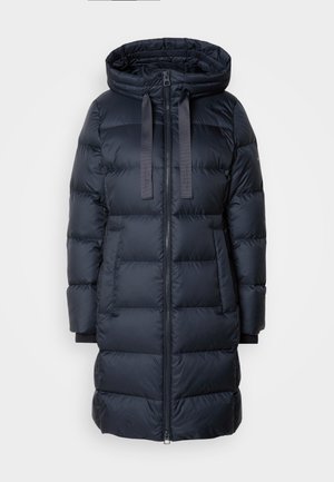 Manteau matelassé marine avec capuche, fabriqué à partir d'un matériau lisse et brillant. Présente une fermeture éclair à l'avant, deux poches latérales et des poignets côtelés.