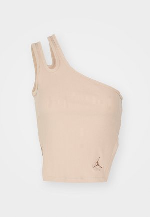 Beidzies viens pleca topiņš, izgatavots no ribota auduma, krēmkrāsā. Tam ir noapaļots dekoltē un uz apakšējās malas ir brūna Jumpman logo.