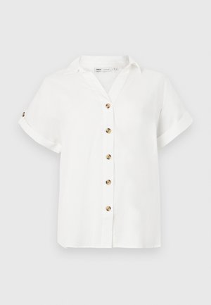Vit blus med kort ärm och krage, med en knappstängning framtill med runda, gyllene knappar. Tillverkad av lättviktig tyg.