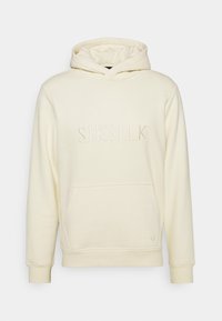 Felpa crema realizzata in tessuto morbido, dotata di tasca a marsupio, logo "SIKSILK" ricamato e polsini a coste. Design semplice, senza fantasie.