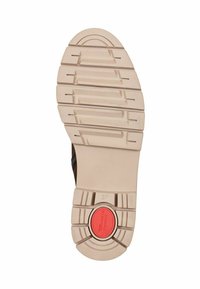 Light brown rubber shoe sole with textured, segmented pattern and red circular accent. Size 37 marked on the bottom.