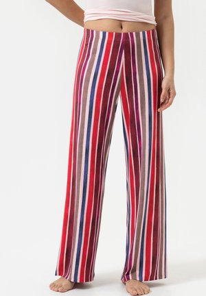 Wijde broek in een zachte stof met verticale strepen in rood, roze, paars en bruin. Elastische tailleband; voetbare detail zichtbaar.