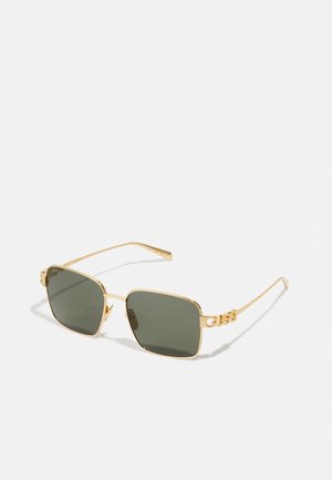 Aurinkolasit - gold-coloured/grey