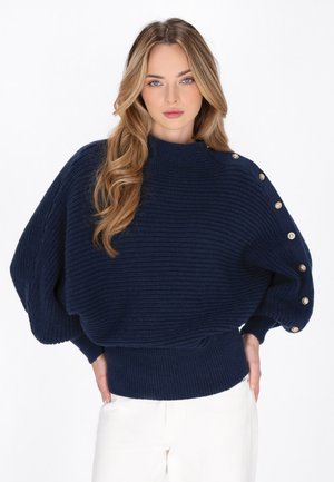 - Sweter
