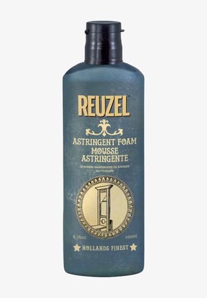 Dunkelblaue Flasche des Reuzel adstringierenden Schaum-Mousse, 200 ml, mit einer Guillotine-Illustration und goldener Schrift auf dem Etikett.