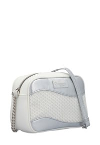 White and silver crossbody bag with a textured mesh design, curved accents, and a silver-toned chain strap. Features a zip closure and logo detail.