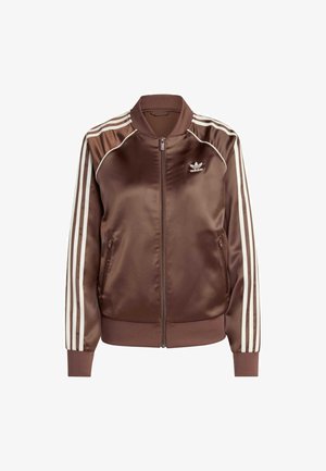 Giacca bomber in raso marrone con strisce bianche lungo le maniche, chiusura con zip, tasche laterali e un piccolo logo sul petto.