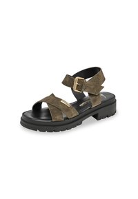 Sandal en suède vert olive avec des sangles croisées, détail de boucle et semelle épaisse noire. Dispose d'une semelle intérieure lisse pour le confort.