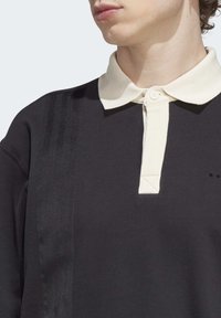 adidas Originals RUG - Polo shirt - black