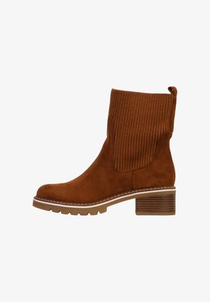 Brauner Wildleder-Stiefelette mit gerippten elastischen seitlichen Einsätzen, einer abgerundeten Spitze und einem gestapelten Absatz. Strukturiert mit weißen Nähdetails.