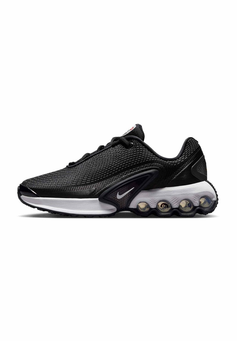 Black mesh sports shoes with white sole, featuring round air cushioning pods, subtle branding, and textured finish on upper material.