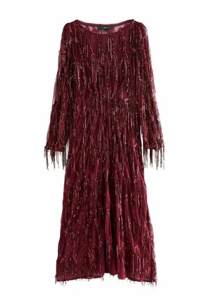 Burgundy dress made of sheer fabric, featuring long sleeves and fringe details with metallic accents cascading down the front.