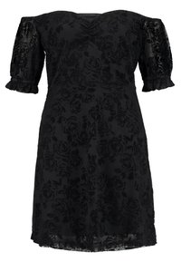 Vestido negro con mangas cortas abullonadas, patrón floral, tejido texturizado, escote en V y falda acampanada. Detalles con volantes en los puños de las mangas.