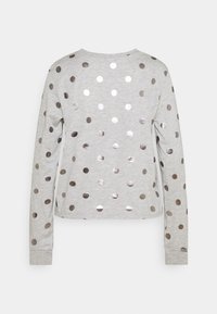 Graues Langarmshirt mit silbernen Foliensticker-Punkten, runder Halsausschnitt und Manschetten, aus weichem Baumwollmaterial.