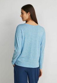 Zweifarbiges Langarmshirt