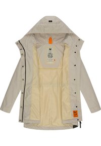 Ljusbeige vattentålig jacka med huva, med en slät yta, kontrasterande orange detaljer och en mjuk beige inre foder.