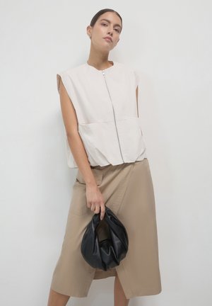 Calliope SMANICATO BALLOON - Waistcoat - gesso