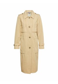 Trench-coat long beige avec fermeture par boutons sur le devant, épaulettes, brides réglables aux manches, col et grandes poches avant.