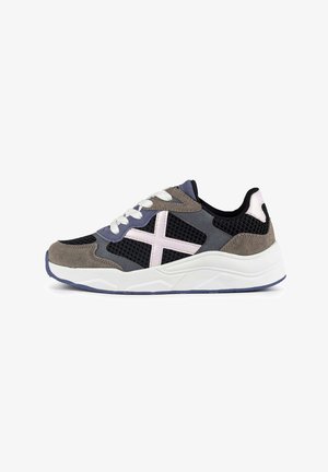 Gray and navy sneaker with mesh and suede material, white laces, pink cross design, and a thick white sole with blue accents.