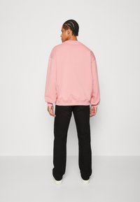 On Vacation DOLCE VITA UNISEX - Sweatshirt - rose