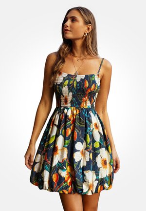 Bloemenprint jurk met een nauwsluitend lijfje en een uitlopende rok. Gemaakt van lichtgewicht stof met een marineblauwe achtergrond en levendige bloemen.