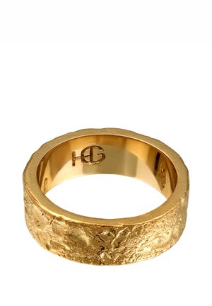 Gold ring with a textured, matte finish and a polished inner surface. Features a subtle logo engraved inside the band.