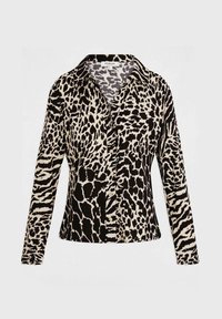 Camicia a maniche lunghe con motivo a stampa animale misto in bianco e nero e colletto classico.