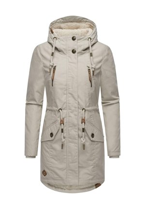 Beige parka jacket with a fleece-lined hood, two front pockets, drawstring waist, and metal and rope accents. Smooth texture, knee-length design.