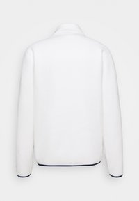 Weiße Fleecejacke mit Kragen, langen Ärmeln und marineblauen Akzenten am Saum und an den Bündchen. Weicher Stoff, schlichtes Design, Rückansicht.